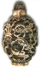 Chinese deeply moulded silver snuff bottle with monkey motif