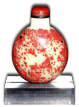 Chinese caramel glass snuff bottle with cinnabar splashes, attributed to Beijing, possibly Imperial, c. 18th century