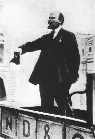 Vladamir Lenin is pictured standing on the bed of a truck addressing a crowd in Red Square.