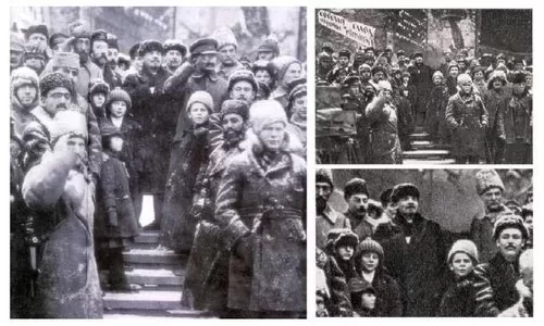 Lenin and Trotsky [center, top of stairs] celebrating second anniversary of the revolution in November 1919. A heavily retouched version was published in 1967. Trotsky has been air-brushed out.