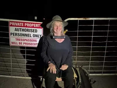 Suey McEnnally, NSW based artist, locked onto sawmill gate