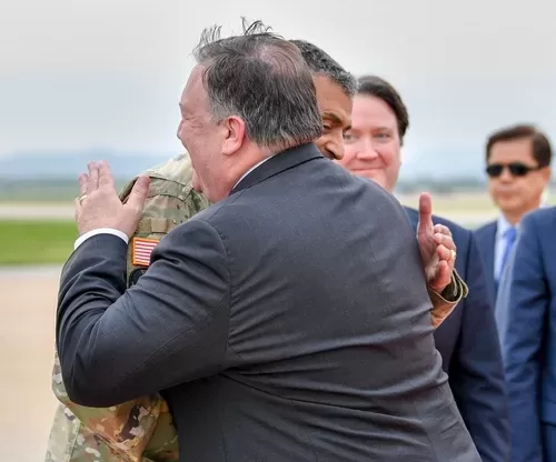 U.S. Secretary of State Mike Pompeo is greeted by USFK Commander General Vincent Brooks upon arrival to Osan Air Base in Osan, Seoul on June 13, 2018. [State Department photo/ Public Domain]