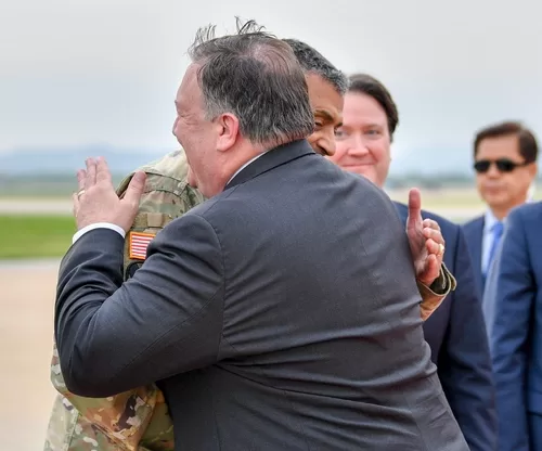 General Vinent Brooks and Secretary of State Mike Pompeo enjoy a warm embrace