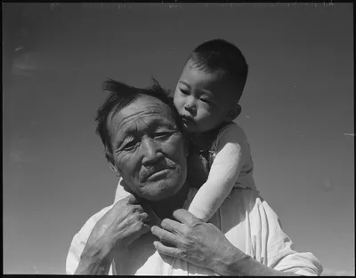 Dorothea Lange's Grandfather and Grandson of Japanese Ancestry at a War Relocation Authority Center, Manzanar, California (July 1942)