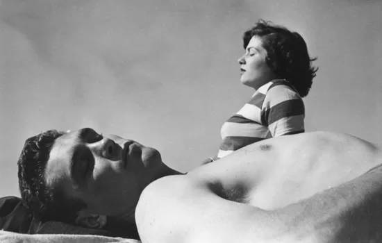 Stanley Kubrick, photographer, Walter Cartier, Prizefighter of Greenwich Village [Cartier and Dolores Germaine on a beach], 1948